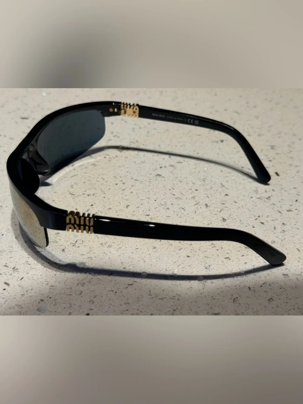 Miu Miu Black Sport Sunglasses with mirror Lenses